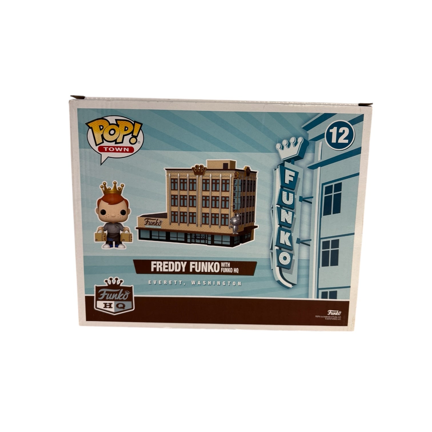 Freddy Funko with shopping bags standing next to Funko HQ building